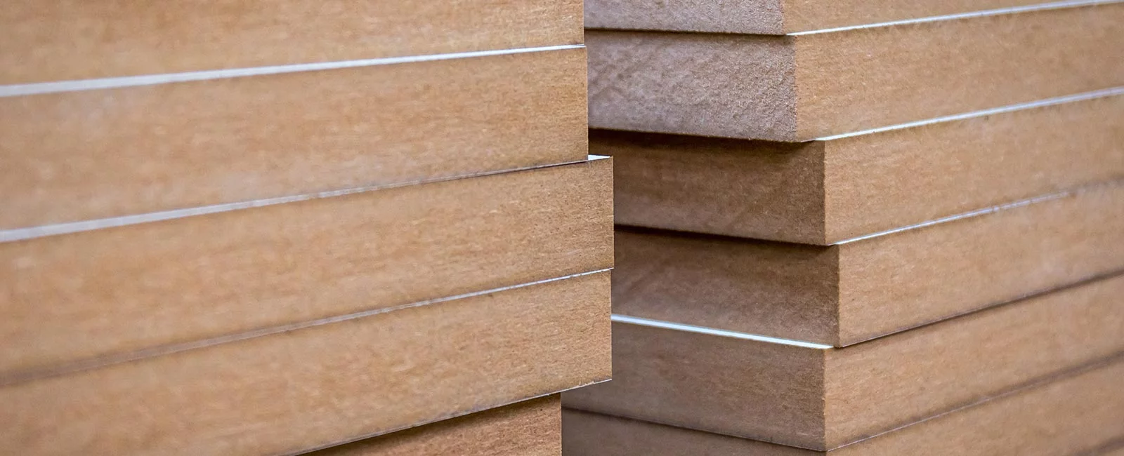 Stacks of medium density fibreboards